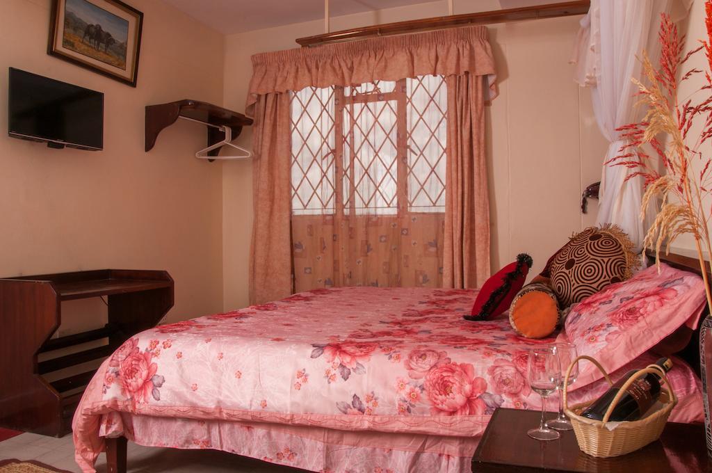Blue Hut Hotel Nairobi Quarto foto