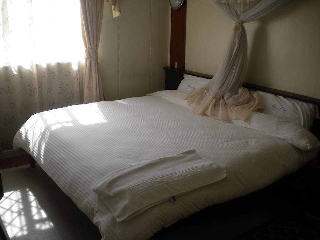 Blue Hut Hotel Nairobi Quarto foto